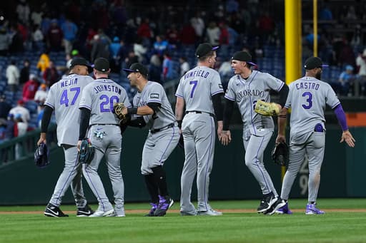 Troy Johnston has go-ahead hit in 11th as Rockies beat Phillies 9-7