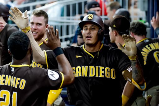 Machado homers twice, Tatis hits longest homer of season to lead Padres to 8-3 win over Braves