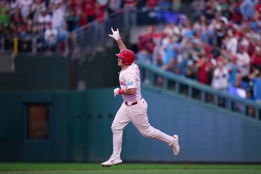 Turner, Harper power Phillies to 12-7 rout of Mariners