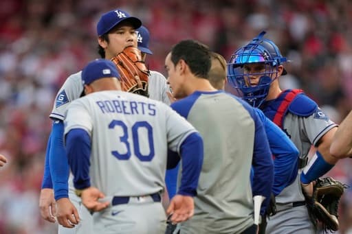 Shohei Ohtani leaves mound with trainer after throwing 6 straight balls, including 2 wild pitches