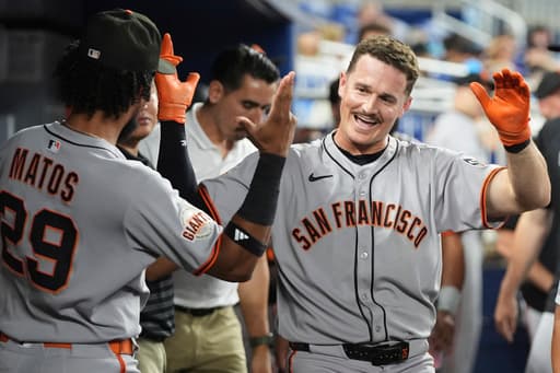 Chapman homers, Harrison pitches five scoreless innings as Giants beat Marlins 2-0