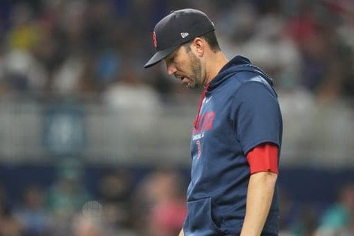 Boston Red Sox interim manager Chad Tracy walks from the mound after a pitching change during the sixth inning of a baseball game against the Miami Marlins, Tuesday, Aug. 25, 2026, in Miami. (AP Photo/Lynne Sladky) (AP Photo/Lynne Sladky)