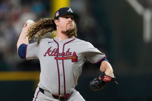 Braves put Grant Holmes on injured list and acquire pitcher Erick Fedde in trade with Cardinals