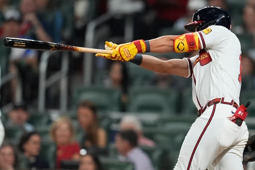 Braves blast 3 homers as Chris Sale shines in a 6-0 opening-night win over the Royals