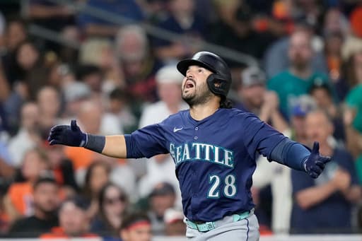 Suárez homers and Woo exits after 5 innings as Mariners beat Astros 4-0 to take over 1st in AL West