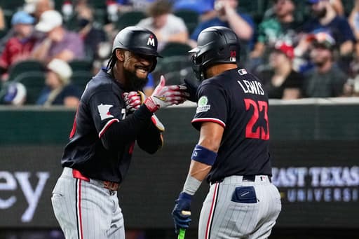 Josh Bell hits 3-run homer and Byron Buxton goes deep for No. 23 as Twins beat Rangers 4-2