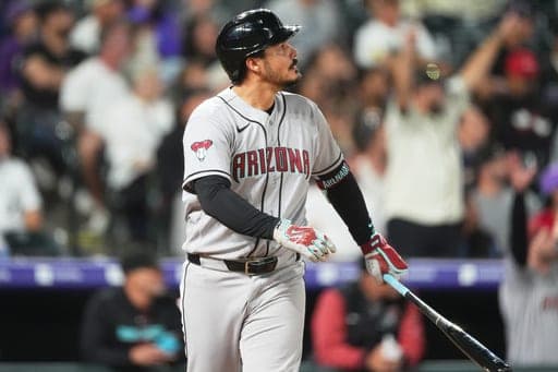 Arizona Diamondbacks' Nolan Arenado heads up the first-base line after connecting for a solo home run off Colorado Rockies relief pitcher Zach Agnos in the seventh inning of a baseball game Tuesday, Sept. 22, 2026, in Denver. (AP Photo/David Zalubowski) (AP Photo/David Zalubowski)