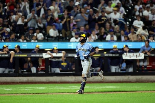 Milwaukee Brewers' Jackson Chourio reacts after hitting a two-run home run during the eighth inning of a baseball game Thursday, Aug. 27, 2026, in New York. (AP Photo/Adam Hunger) (AP Photo/Adam Hunger)