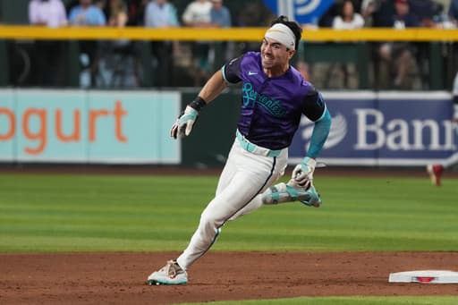 Carroll has a 3-run triple in the 8th to help the Diamondbacks beat the Twins 9-5