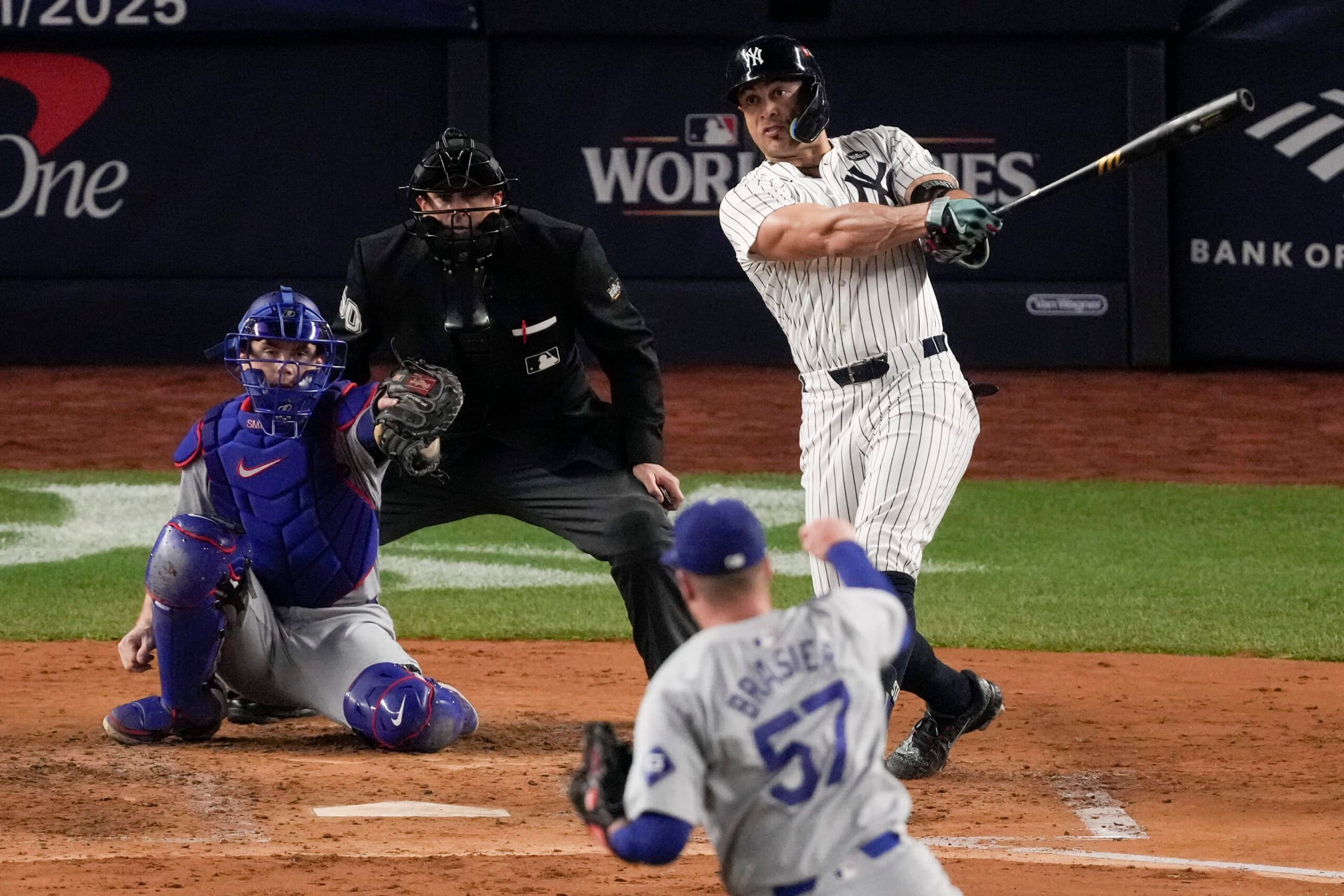 New York Yankees' Giancarlo Stanton watches a home run against the Los Angeles Dodgers during the third inning in Game 5 of the baseball World Series, Wednesday, Oct. 30, 2024, in New York. (AP Photo/Frank Franklin II)