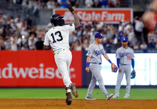 Jazz Chisholm Jr. hits tiebreaking homer in 8th and Yankees beat Dodgers 2-1 to split doubleheader