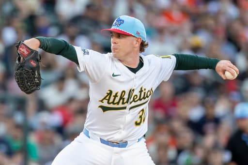 Athletics cruise past Giants 11-2 with six scoreless innings from Sears