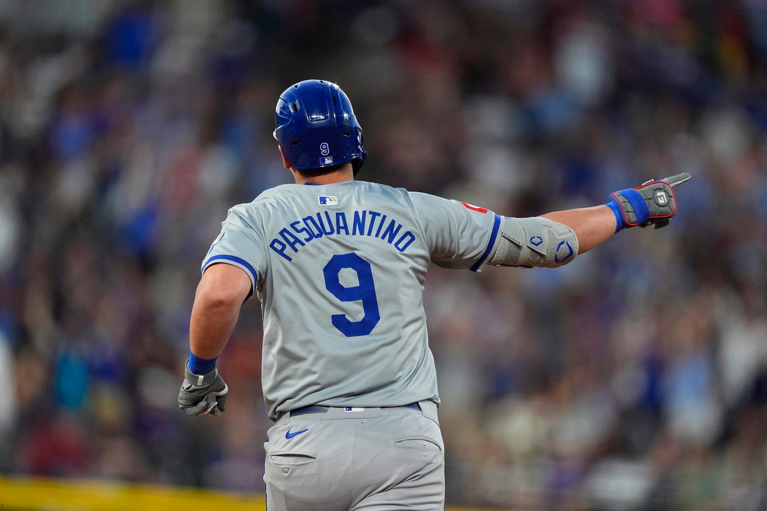 Kansas City Royals' Vinny Pasquantino gestures as he circles the bases after hitting a solo home run off Colorado Rockies starting pitcher Austin Gomber in the isxth inning of a baseball game Saturday, July 6, 2024, in Denver. (AP Photo/David Zalubowski)