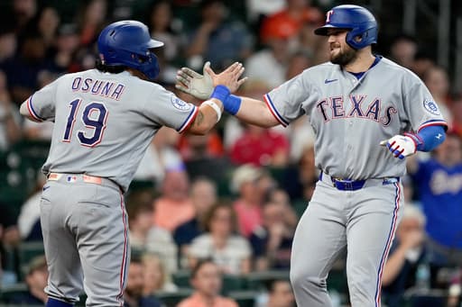 Burger blasts a homer, drives in 4 as Eovaldi powers the Rangers past the Astros 8-0
