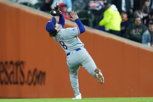 Rangers say second baseman Josh Smith will be hospitalized at least a week with viral meningitis