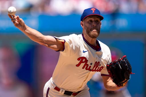 Zack Wheeler throws 1-hitter for first complete game since 2021, leading Phillies past Reds