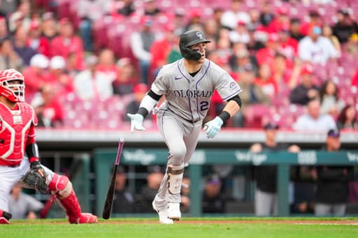 Goodman hits 2 HRs, Sugano pitches 5 1/3 scoreless innings, Rockies beat Reds 13-2