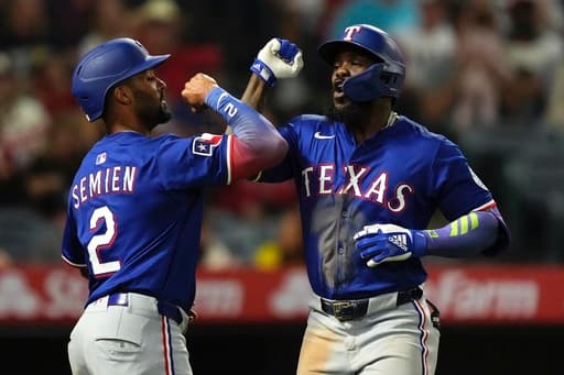 Semien and Seager propel Rangers to 11-4 blowout of Angels