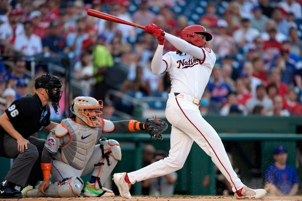 Top prospect James Wood singles in his first major league at-bat for the Nationals against the Mets