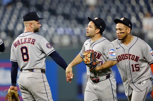 Astros rally past Royals 8-7 after Altuve ties it and a ninth-inning miscue