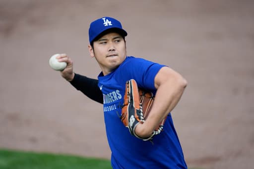 Dodgers star Shohei Ohtani plays catch as he continues his comeback from elbow surgery
