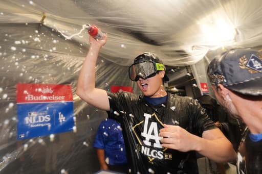 Dodgers rolling in defense of World Series title after closing out Phillies to reach NLCS