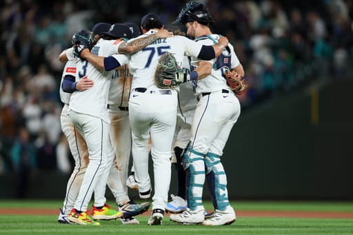 Mariners have big sixth inning to back Woo in an 8-3 victory over the Angels