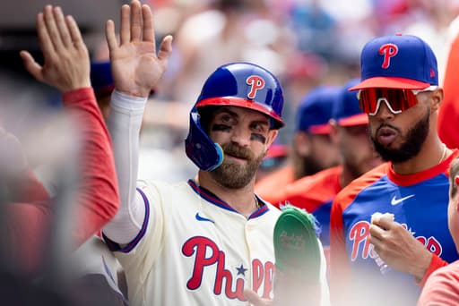 Phillies hold on after Miami’s 6-run 9th to beat Marlins 11-10