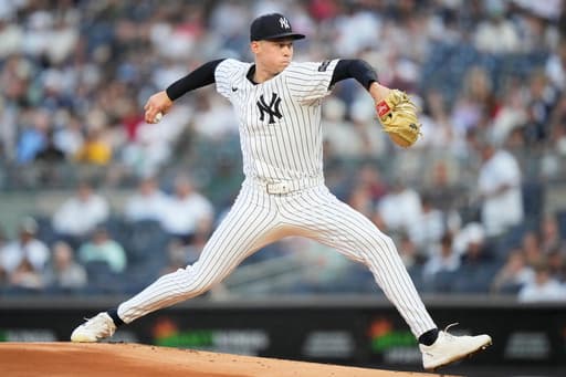 Warren pitches 6 2/3 innings to lead the Yankees to 6-2 win over the Twins