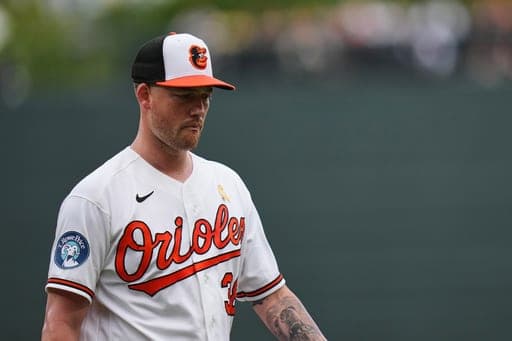 Baltimore Orioles starting pitcher Kyle Bradish returns to the dugout after retiring the side in the second inning of a baseball game against the Boston Red Sox, Sunday, Sept. 6, 2026, in Baltimore. (AP Photo/Stephanie Scarbrough) (AP Photo/Stephanie Scarbrough)