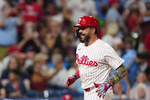 Philadelphia Phillies' Kyle Schwarber reacts after hitting a solo home run off St. Louis Cardinals' Pedro Pagés during the eighth inning of a baseball game, Saturday, Aug. 22, 2026, in Philadelphia. (AP Photo/Derik Hamilton) (AP Photo/Derik Hamilton)