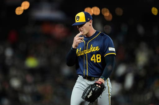 Brewers send right-hander Craig Yoho to minors while calling up Elvin Rodríguez