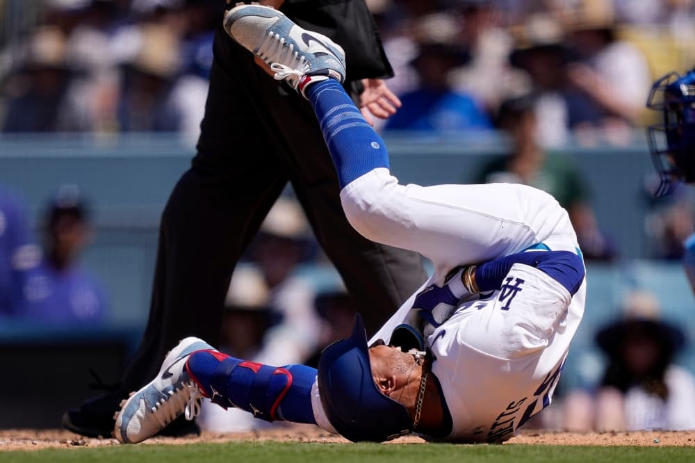 Mookie Betts put on IL by Dodgers with broken left hand after getting hit by fastball