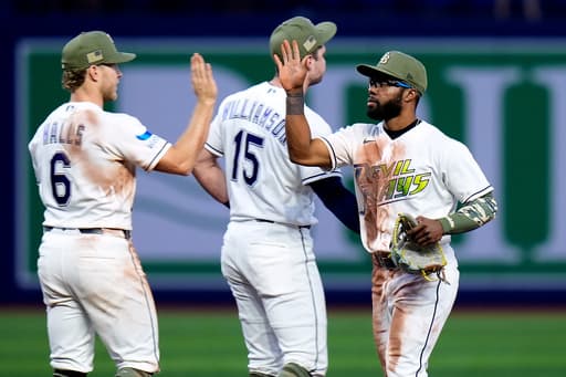 Mullins homers and has 3 singles to help AL East-leading Rays beat Marlins 7-2
