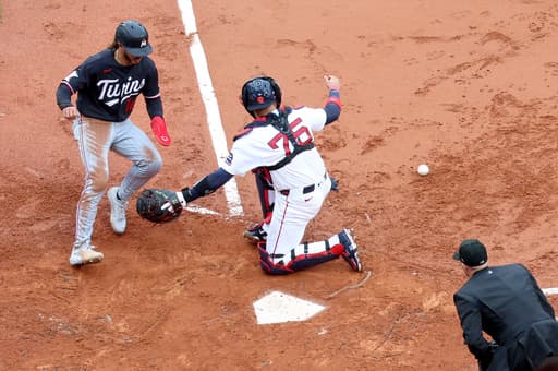 Twins complete three-game sweep over Red Sox with 6-5 win at soggy Fenway Park