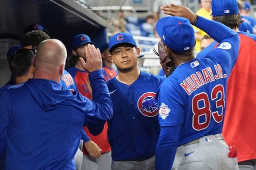 Chicago Cubs starting pitcher Shota Imanaga is congratulated by teammates after pitching seven inning during a baseball game against the Miami MarlinsFriday, Sept. 4, 2026, in Miami. (AP Photo/Marta Lavandier) (AP Photo/Marta Lavandier)