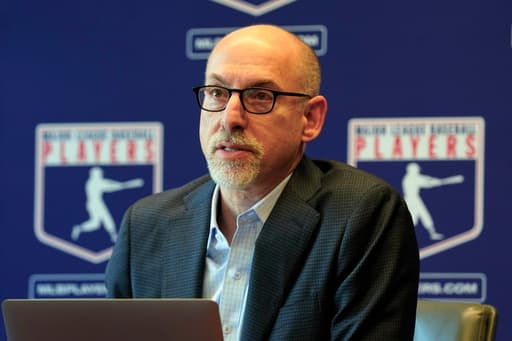 Baseball union head criticizes MLB salary cap ad campaign, says claims of economic woe are perverse