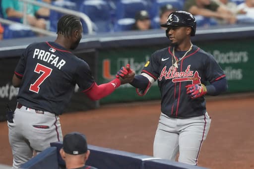 Albies hits 2 HRs, Braves uses 9-run 9th to beat Marlins 11-2