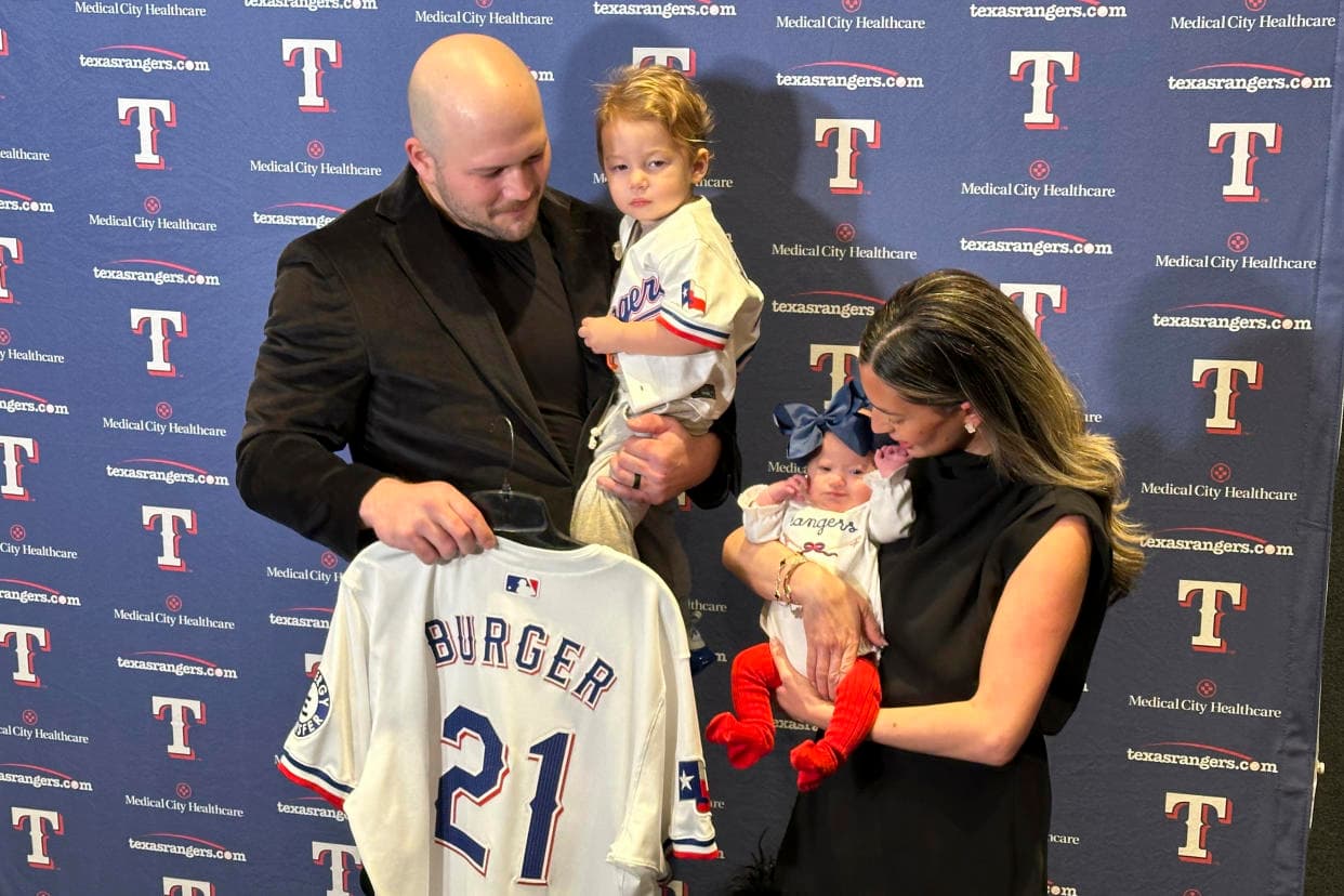 Jake Burger will wear No. 21 with the Texas Rangers for his daughter born with Down syndrome
