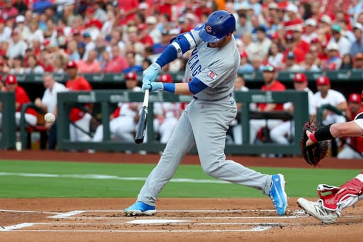 Cubs race to an early 7-run lead on the way to a 10-2 win over the Cardinals