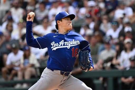 Yoshinobu Yamamoto carries no-hit bid into 9th as Dodgers beat White Sox 7-1