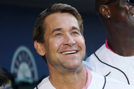 Texas Rangers hire former All-Star Bret Boone, brother of Yankees manager, as a hitting coach