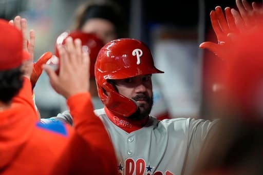 Murphy homers in his return from a rib injury as the Braves beat the Phillies 7-5