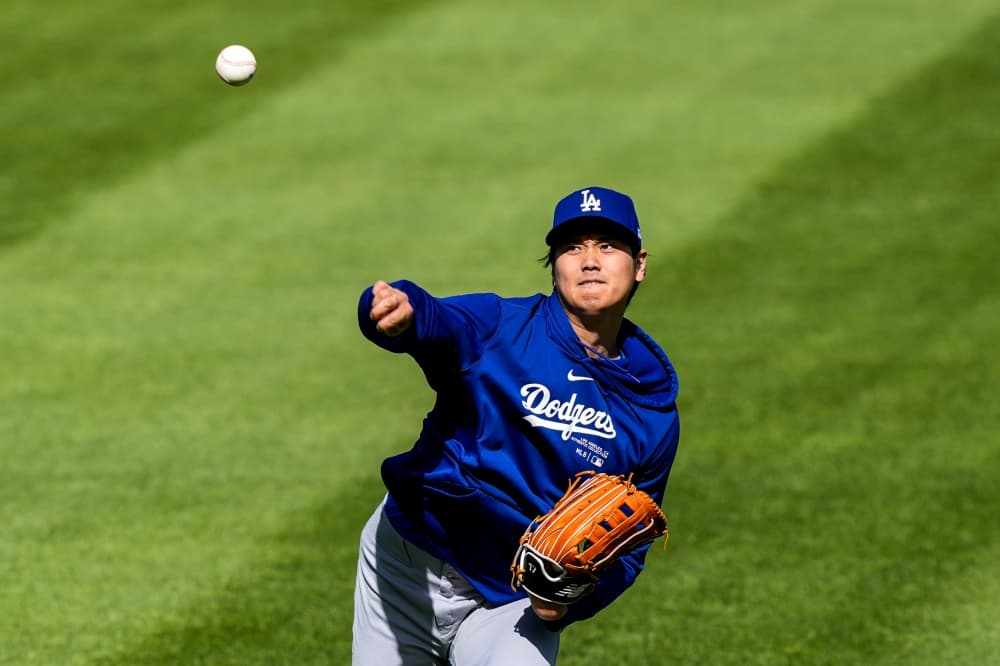 Dodgers manager Dave Roberts working with Shohei Ohtani on strike zone discipline