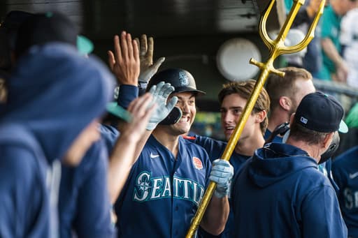 Mariners slug 4 homers in their 9-2 victory over the Athletics