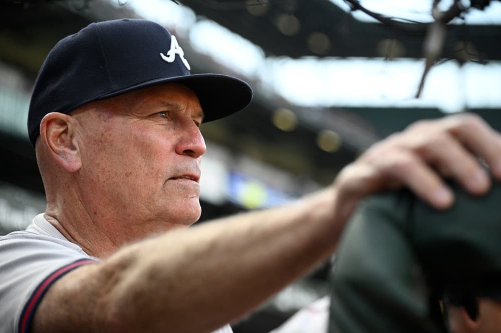 Braves manager Brian Snitker smiles 1 day after being hit below the belt by a foul ball