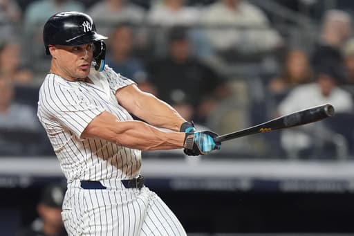 Yankees beat White Sox 5-3 behind Stanton and Rodón to stay tied with Toronto for AL East lead
