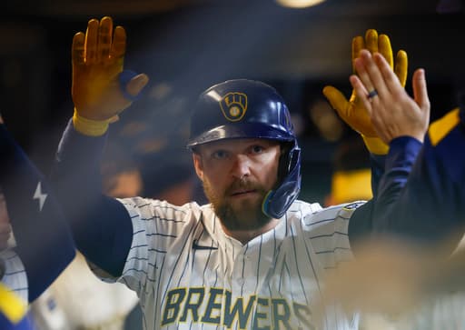 Hoskins and Henderson help Brewers beat Athletics 14-1 before starting a 10-game trip