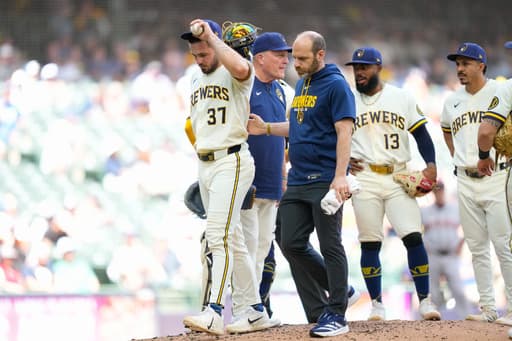 Brewers place DL Hall on injured list and designate Jake Woodford for assignment