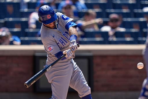 Dansby Swanson has 2 homers, 7 RBIs as Cubs pound Mets 10-3 in Game 1